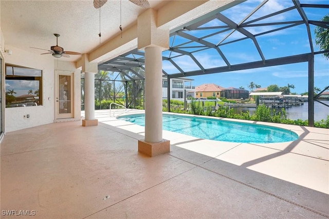 3206 SW 4th Ln, Cape Coral, FL 33991 - outdoor pool featuring a ceiling fan, a patio, and glass enclosure