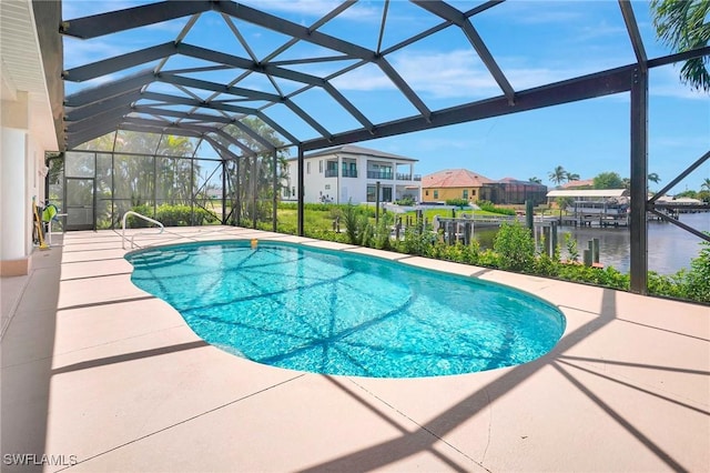 3206 SW 4th Ln, Cape Coral, FL 33991 - swimming pool featuring a patio area, a water view, glass enclosure, and a residential view