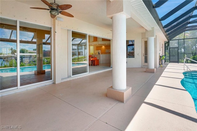3206 SW 4th Ln, Cape Coral, FL 33991 - view of patio with a ceiling fan, an outdoor pool, and glass enclosure