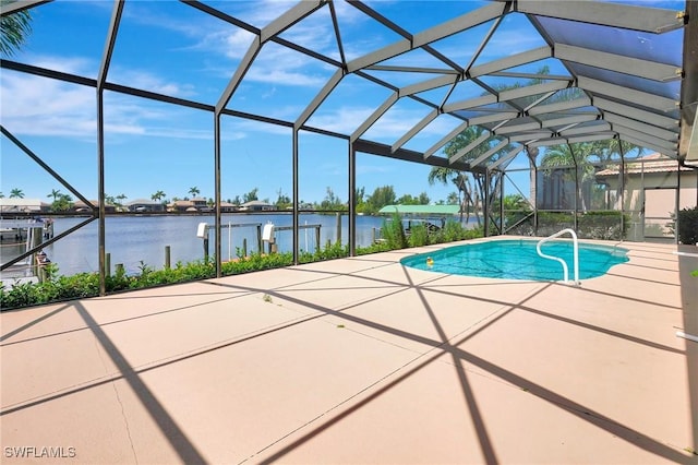 3206 SW 4th Ln, Cape Coral, FL 33991 - outdoor pool featuring a water view, a patio, a dock, and a lanai