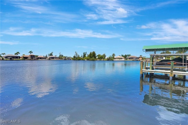 3206 SW 4th Ln, Cape Coral, FL 33991 - dock area with boat lift and a water view