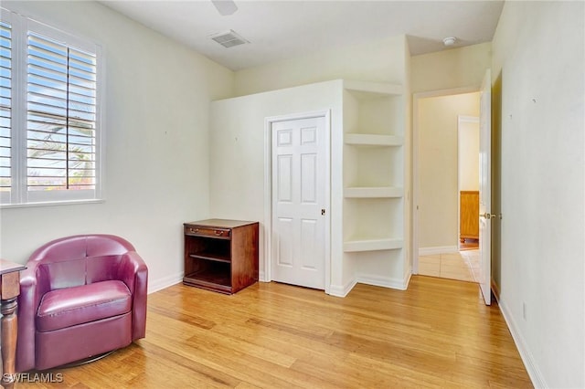 3206 SW 4th Ln, Cape Coral, FL 33991 - unfurnished room with light wood-type flooring and built in features