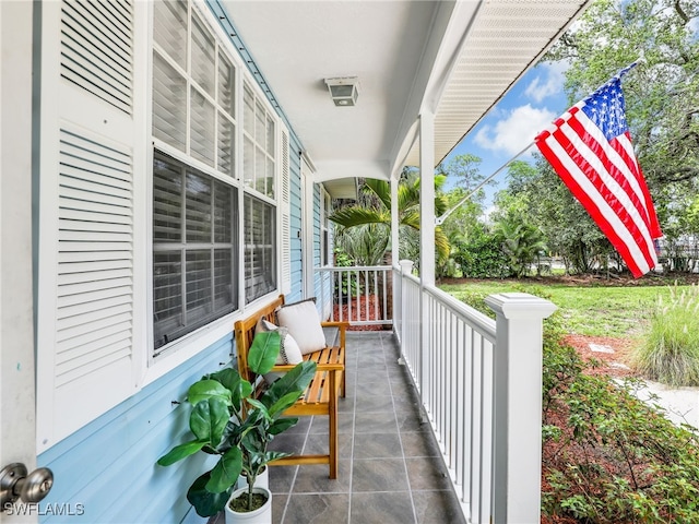 1492 La Petite Ct, Naples, FL 34104 - view of covered porch
