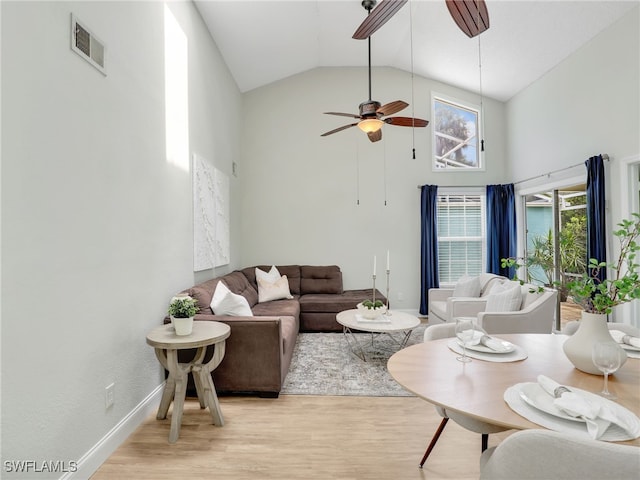 1492 La Petite Ct, Naples, FL 34104 - living area with ceiling fan, light wood finished floors, and high vaulted ceiling
