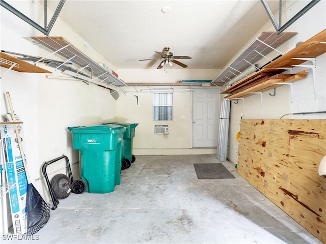 1492 La Petite Ct, Naples, FL 34104 - garage with ceiling fan and a wall mounted air conditioner