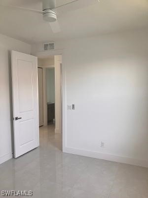 1905 SW 3rd St, Cape Coral, FL 33991 - unfurnished room featuring baseboards