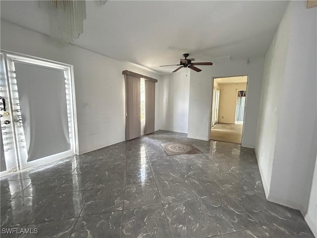 211 Oakmont Pkwy, Lehigh Acres, FL 33936 - empty room featuring ceiling fan
