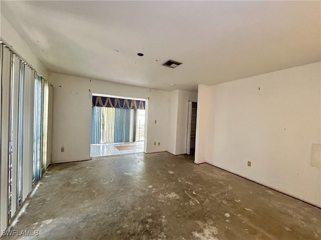 211 Oakmont Pkwy, Lehigh Acres, FL 33936 - spare room with unfinished concrete floors