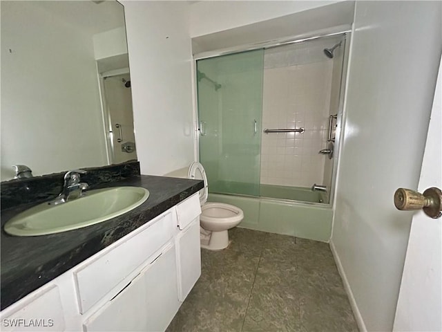 211 Oakmont Pkwy, Lehigh Acres, FL 33936 - full bathroom featuring vanity, enclosed tub / shower combo, and tile patterned flooring