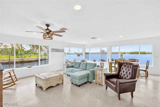 867 Oak St, Fort Myers Beach, FL 33931 - living area featuring plenty of natural light, recessed lighting, a water view, and ceiling fan