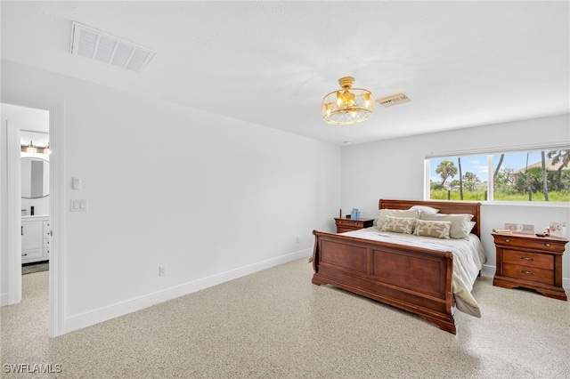 867 Oak St, Fort Myers Beach, FL 33931 - bedroom with a chandelier and baseboards