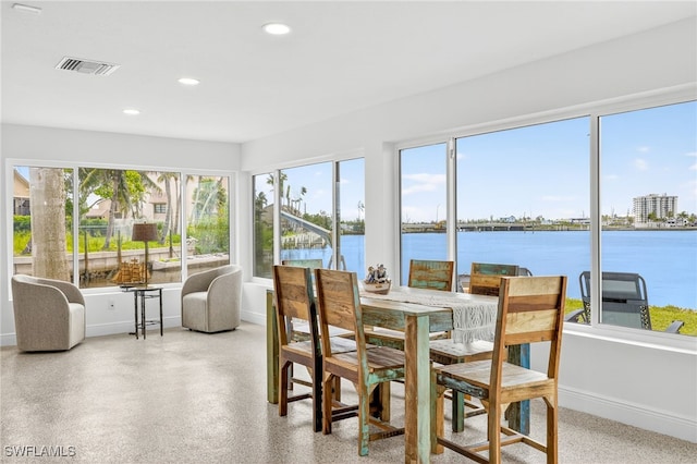 867 Oak St, Fort Myers Beach, FL 33931 - sunroom / solarium featuring healthy amount of natural light and a water view