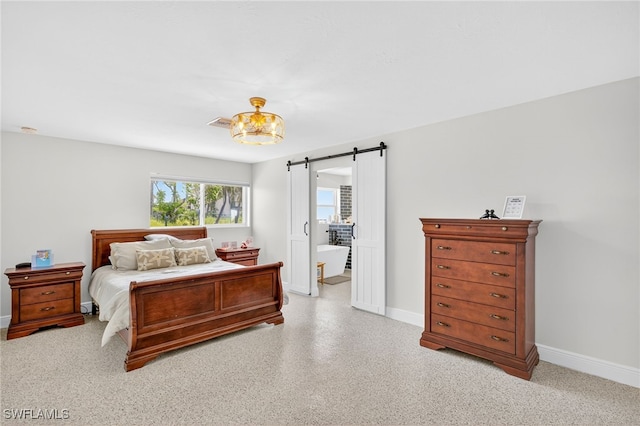 867 Oak St, Fort Myers Beach, FL 33931 - bedroom with baseboards and a barn door