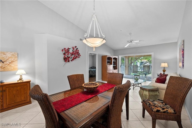 2456 Millcreek Ln Unit 201, Naples, FL 34119 - dining space featuring light tile patterned flooring, ceiling fan, and high vaulted ceiling