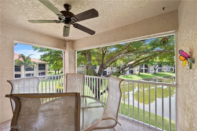 2456 Millcreek Ln Unit 201, Naples, FL 34119 - sunroom featuring a water view