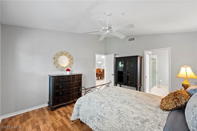 2456 Millcreek Ln Unit 201, Naples, FL 34119 - bedroom featuring lofted ceiling, light wood-style floors, and ceiling fan