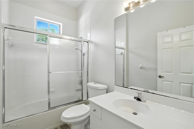 1000 L Ambiance Cir Unit 205, Naples, FL 34108 - bathroom with vanity and bath / shower combo with glass door