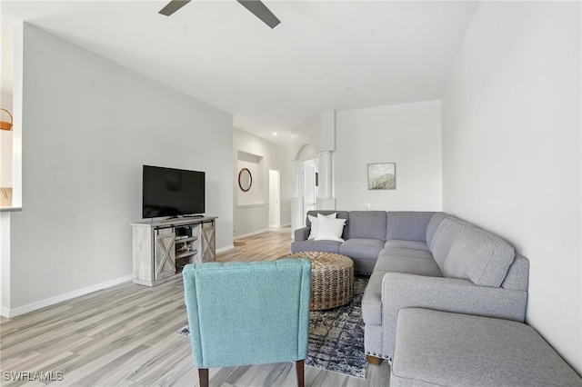 1000 L Ambiance Cir Unit 205, Naples, FL 34108 - living room with light wood-type flooring, a ceiling fan, and ornate columns