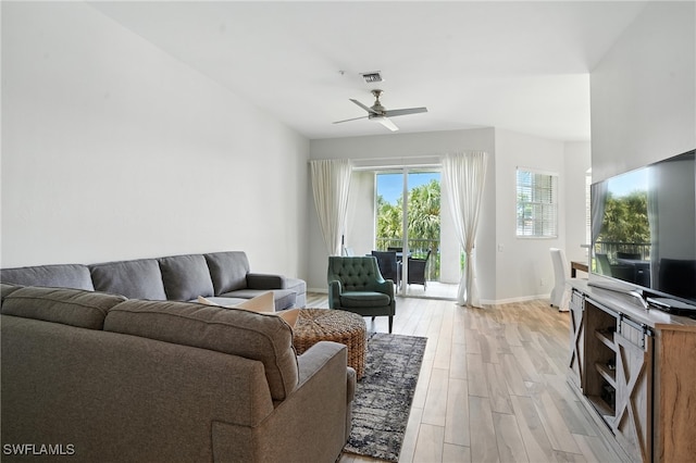 1000 L Ambiance Cir Unit 205, Naples, FL 34108 - living area with light wood-style floors and ceiling fan