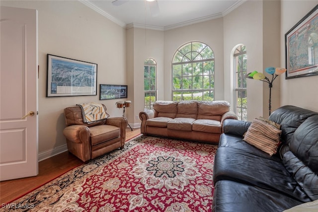 13915 Collier Blvd, Naples, FL 34119 - living room featuring wood finished floors, crown molding, and ceiling fan