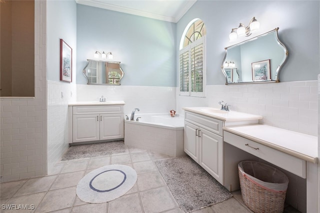13915 Collier Blvd, Naples, FL 34119 - full bathroom with tile walls, ornamental molding, two vanities, a garden tub, and a wainscoted wall
