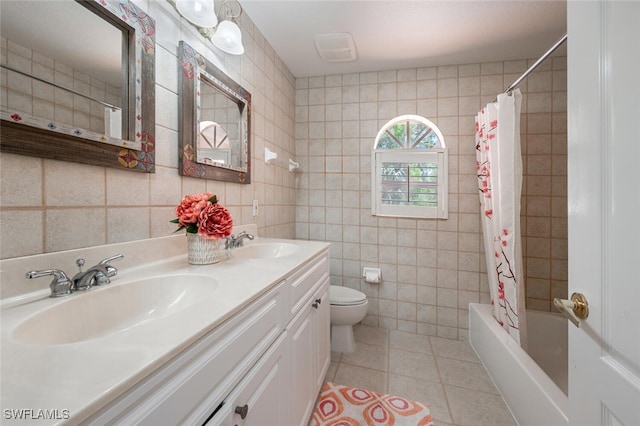 13915 Collier Blvd, Naples, FL 34119 - bathroom featuring tile walls, tile patterned floors, double vanity, and shower / bath combo