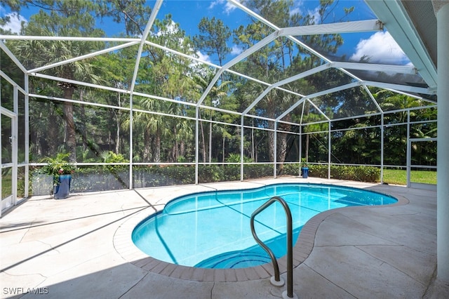 13915 Collier Blvd, Naples, FL 34119 - outdoor pool with a patio and glass enclosure