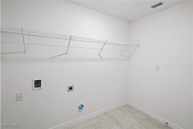 226 NW 19th Pl, Cape Coral, FL 33993 - laundry area with hookup for an electric dryer and baseboards