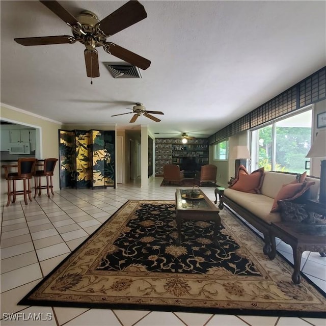 1101 E Jasmine Rd, Lehigh Acres, FL 33936 - living area featuring ceiling fan and light tile patterned floors