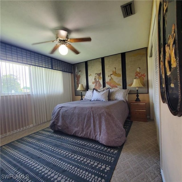 1101 E Jasmine Rd, Lehigh Acres, FL 33936 - carpeted bedroom with a ceiling fan