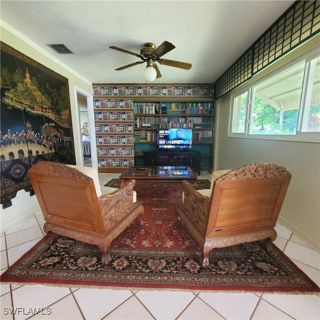 1101 E Jasmine Rd, Lehigh Acres, FL 33936 - living area featuring ceiling fan and tile patterned floors