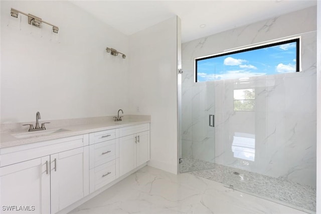 147 Partridge St, Lehigh Acres, FL 33974 - bathroom with a marble finish shower, marble tiled floors, and double vanity