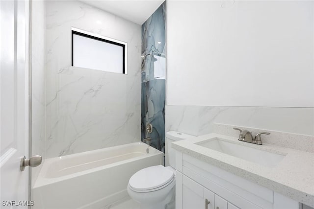 147 Partridge St, Lehigh Acres, FL 33974 - bathroom featuring tile walls, vanity,  shower combination, and a wainscoted wall