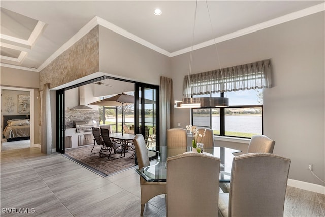 7478 Winding Cypress Dr, Naples, FL 34114 - dining room featuring ornamental molding and a water view