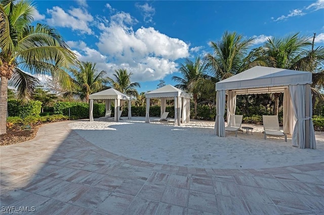 7478 Winding Cypress Dr, Naples, FL 34114 - view of patio / terrace with a gazebo