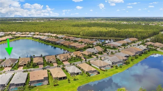 7478 Winding Cypress Dr, Naples, FL 34114 - aerial perspective of suburban area featuring a forest and a nearby body of water