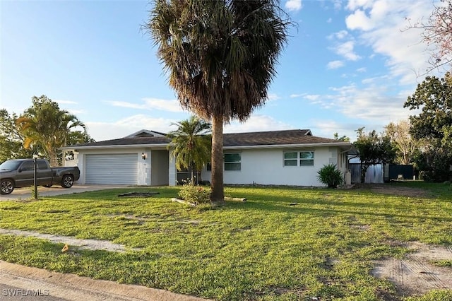 1407 Alwynne Dr, Lehigh Acres, FL 33936 - single story home featuring an attached garage, stucco siding, a front yard, and driveway