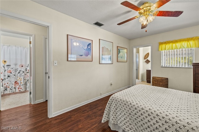 326 Canyon Dr N, Lehigh Acres, FL 33936 - bedroom with dark wood finished floors and ceiling fan