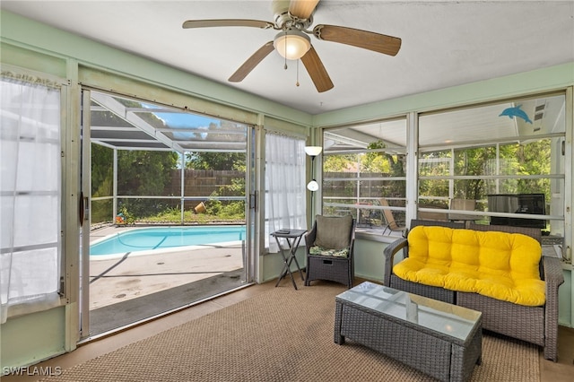 326 Canyon Dr N, Lehigh Acres, FL 33936 - sunroom with ceiling fan and a pool