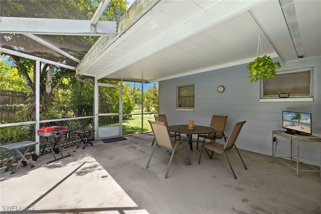 326 Canyon Dr N, Lehigh Acres, FL 33936 - sunroom / solarium with outdoor dining space