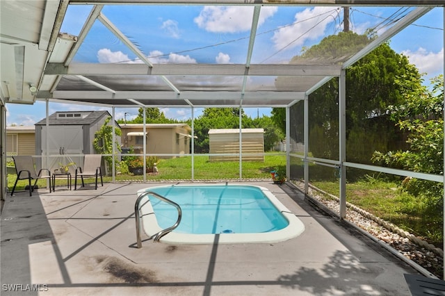 326 Canyon Dr N, Lehigh Acres, FL 33936 - outdoor pool with a storage shed, a patio, and glass enclosure