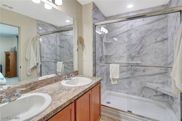 6425 Estero Bay Dr, Fort Myers, FL 33908 - bathroom featuring double vanity, a marble finish shower, and recessed lighting