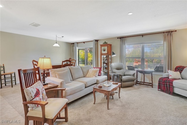 6425 Estero Bay Dr, Fort Myers, FL 33908 - living area with plenty of natural light, light carpet, and recessed lighting