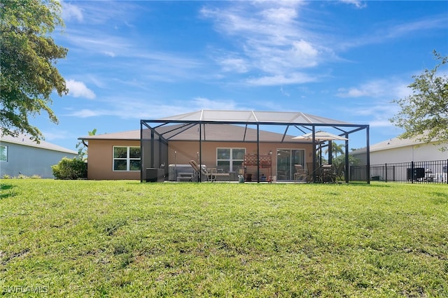 6425 Estero Bay Dr, Fort Myers, FL 33908 - rear view of house featuring glass enclosure and stucco siding
