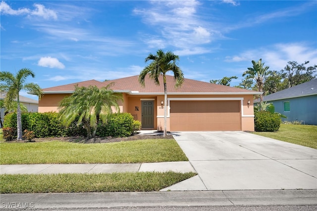 6425 Estero Bay Dr, Fort Myers, FL 33908 - ranch-style house featuring stucco siding, driveway, a garage, and a front lawn