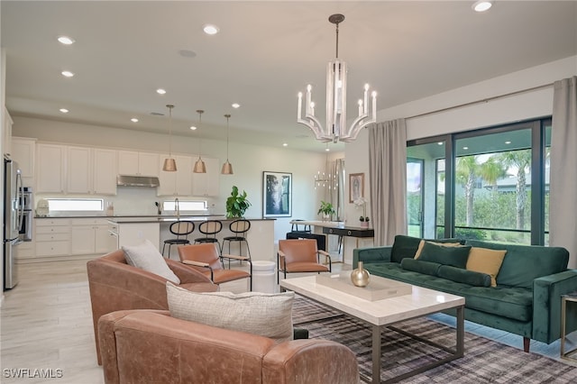 4442 Battlecreek Way, Ave Maria, FL 34142 - living area with a chandelier, light wood-type flooring, and recessed lighting
