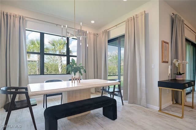 4442 Battlecreek Way, Ave Maria, FL 34142 - dining space featuring light wood-style floors and recessed lighting