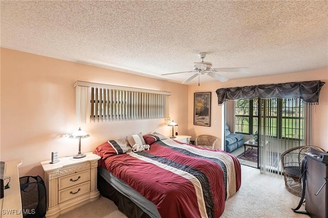 2127 SW Pine Ln Unit 3, Cape Coral, FL 33991 - bedroom with access to outside, light carpet, a textured ceiling, and a ceiling fan