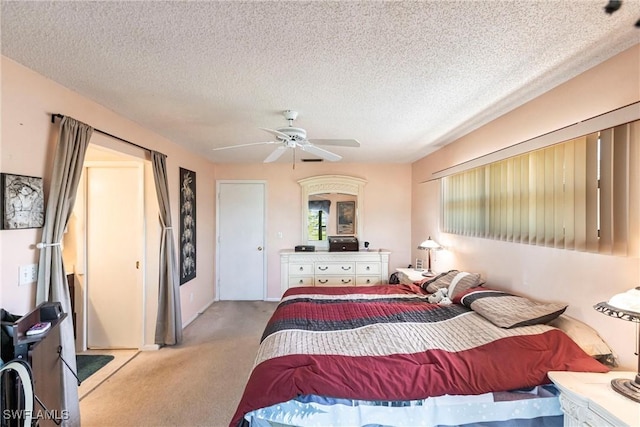 2127 SW Pine Ln Unit 3, Cape Coral, FL 33991 - carpeted bedroom with a textured ceiling and a ceiling fan