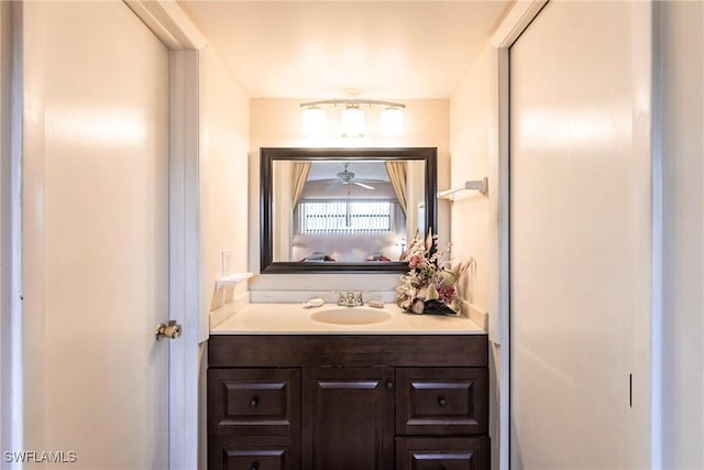 2127 SW Pine Ln Unit 3, Cape Coral, FL 33991 - bathroom with vanity and a ceiling fan